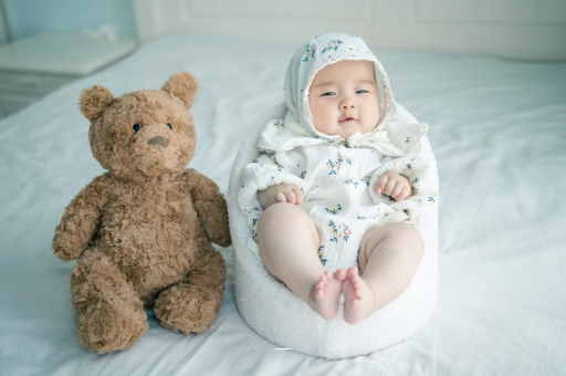 赤峰宝宝吐奶是什么原因